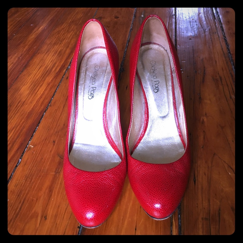 Red leather pumps